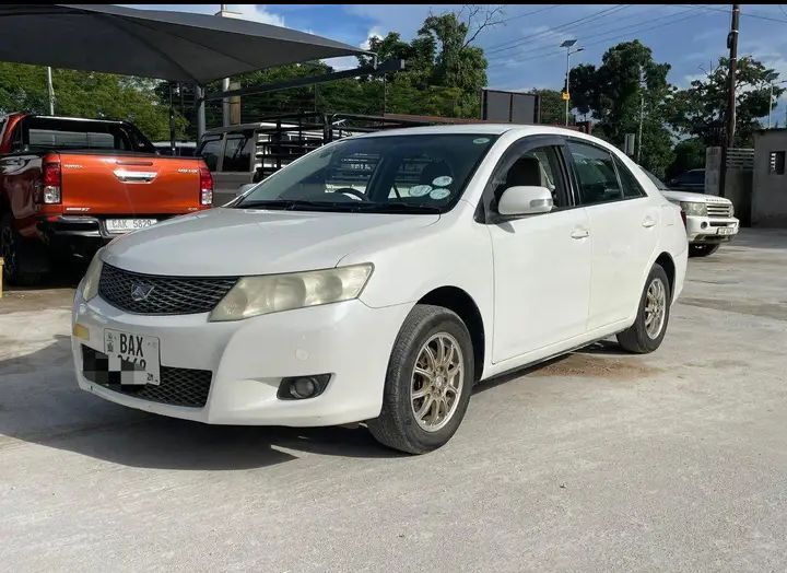 White Toyota allion